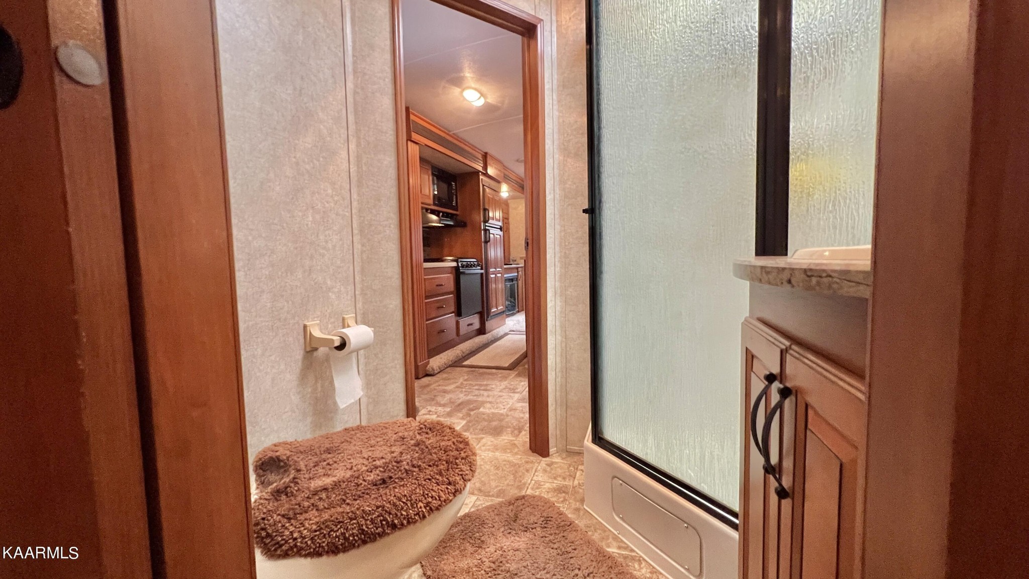 4965 Jones Cove Road Cosby, TN 37722 - Photo 46 of 50 a view of a bathroom from a corridor