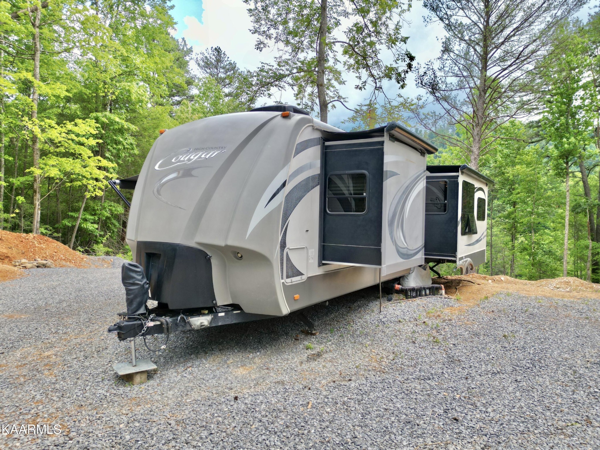 4965 Jones Cove Road Cosby, TN 37722 - Photo 8 of 50 a car parked in front of a house
