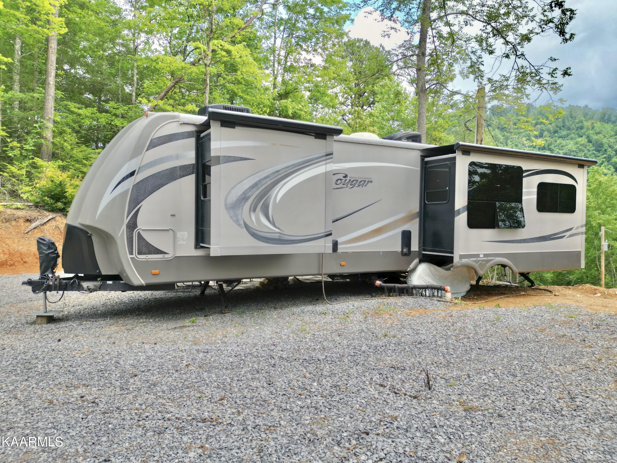 4965 Jones Cove Road Cosby, TN 37722 - Photo 9 of 50 a house view with a backyard space