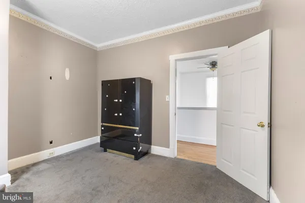 a view of an entryway with front door