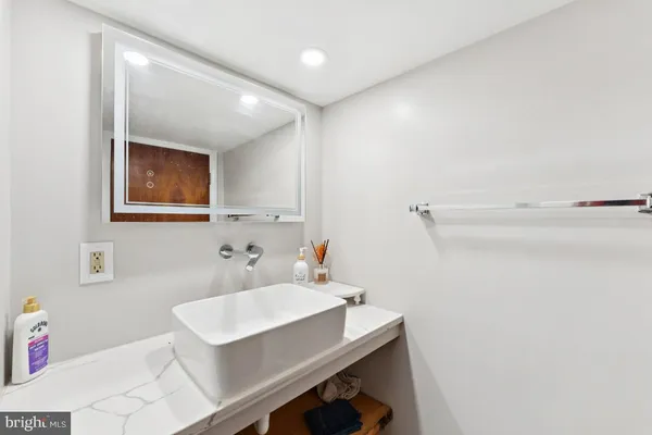 a view of room with window and ceiling fan