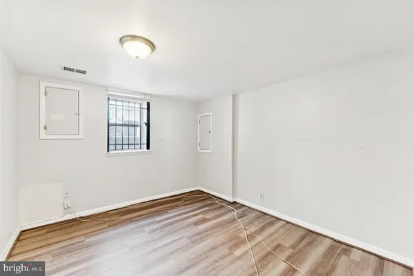 a view of empty room with windows