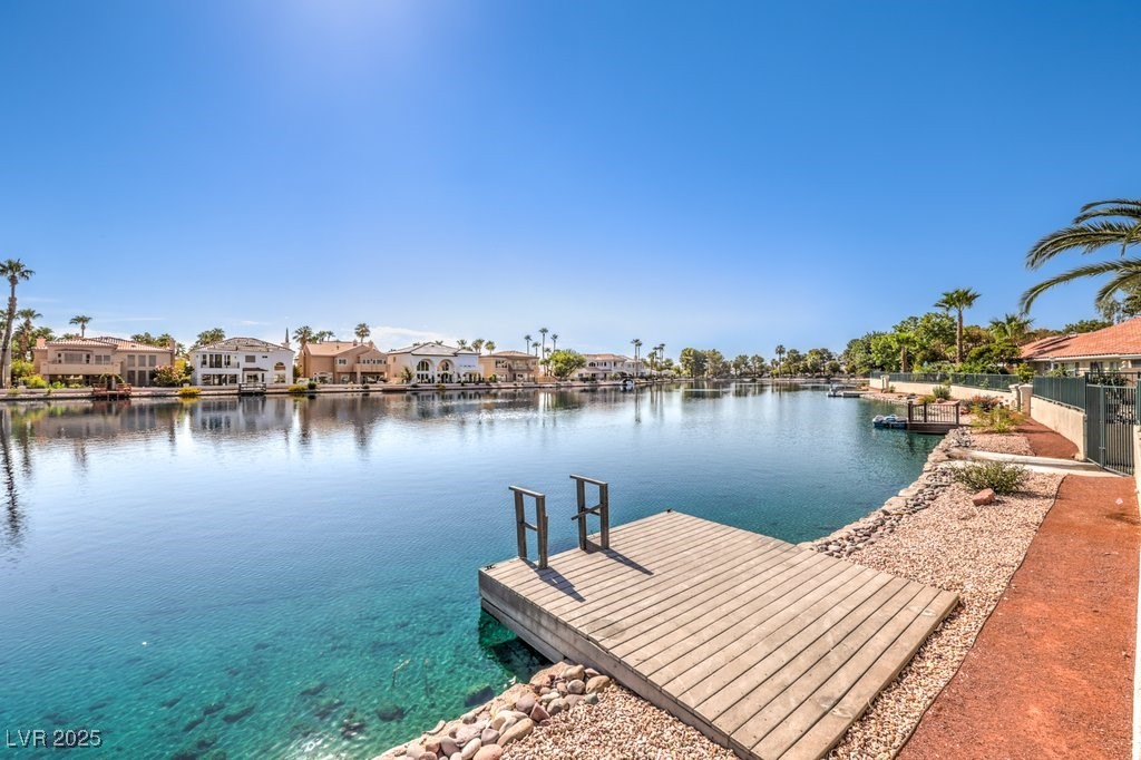 2432 Ocean Front Drive Las Vegas, NV 89128 - Photo 44 of 53 Dock featuring a residential view and a water view