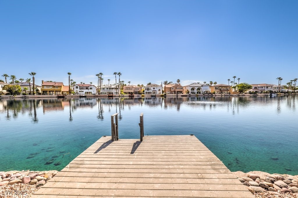 2432 Ocean Front Drive Las Vegas, NV 89128 - Photo 45 of 53 Dock featuring a residential view and a water view