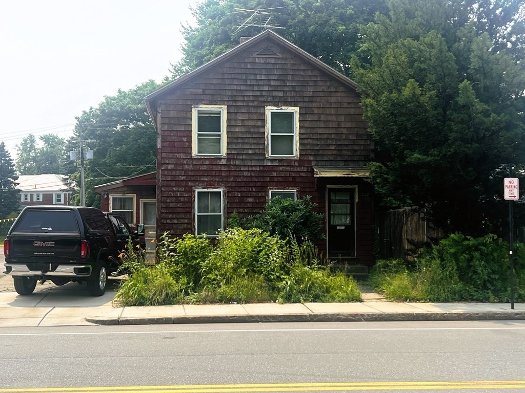 a car parked in front of a house