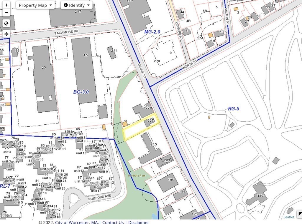 227 Grove Street Worcester, MA 01605 - Photo 3 of 6 a bathroom with a bathtub and shower