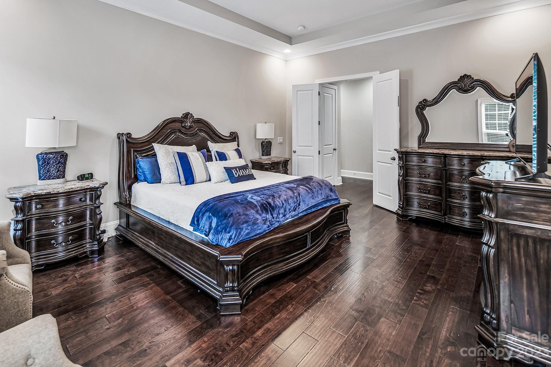 1004 Princessa Drive Wesley Chapel, NC 28104 - Photo 20 of 40 a bed room with a bed and a dresser