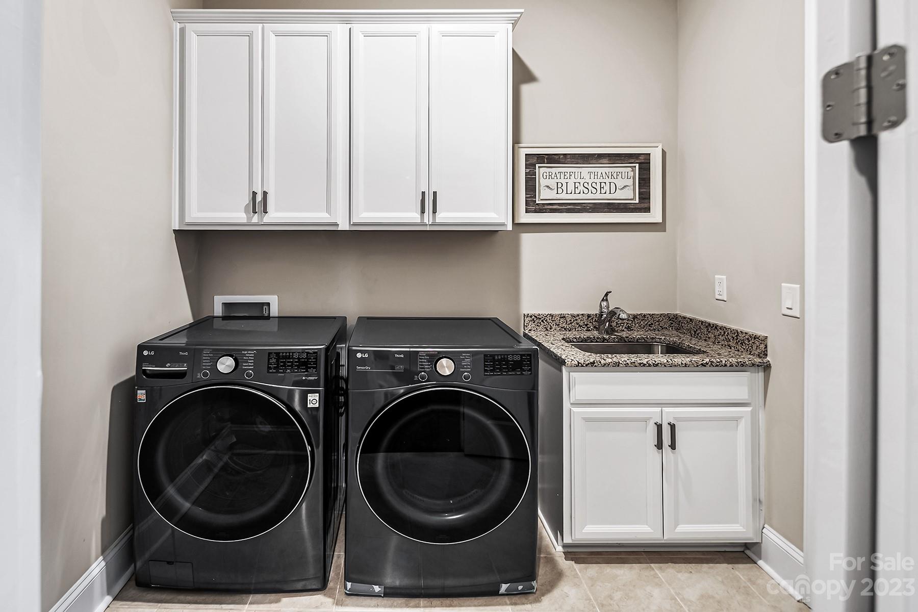1004 Princessa Drive Wesley Chapel, NC 28104 - Photo 25 of 40 a utility room with dryer and washer