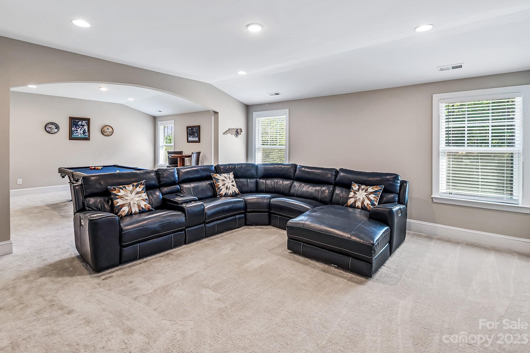 1004 Princessa Drive Wesley Chapel, NC 28104 - Photo 31 of 40 a living room with furniture and a large window