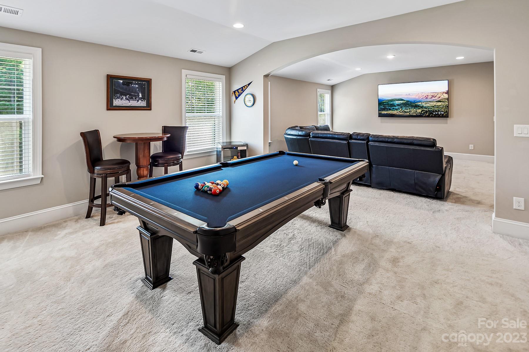 1004 Princessa Drive Wesley Chapel, NC 28104 - Photo 33 of 40 a room with furniture pool table and windows