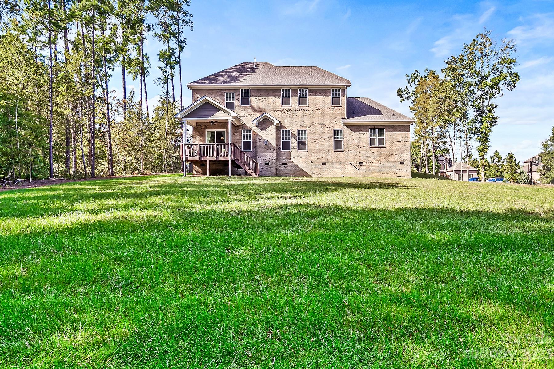 1004 Princessa Drive Wesley Chapel, NC 28104 - Photo 35 of 40 a view of a house with a big yard