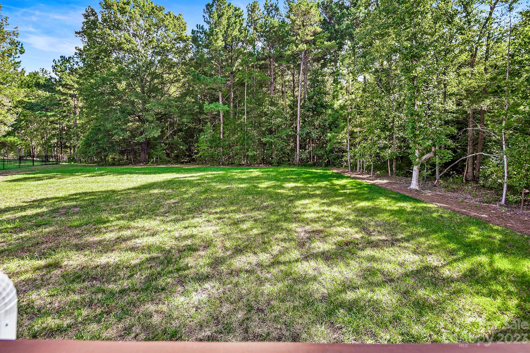 1004 Princessa Drive Wesley Chapel, NC 28104 - Photo 37 of 40 a view of a field with a tree