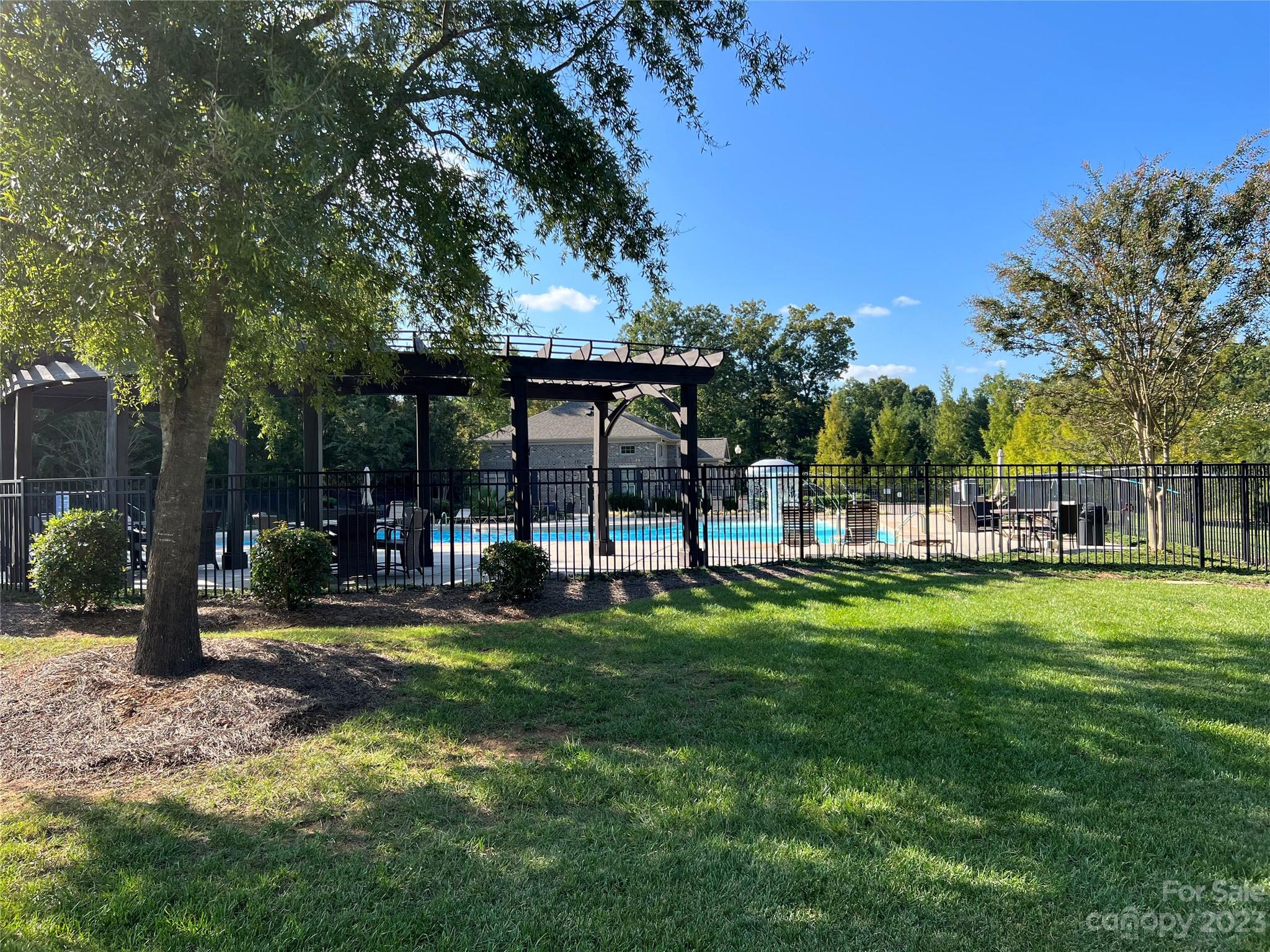 1004 Princessa Drive Wesley Chapel, NC 28104 - Photo 40 of 40 a view of a house with backyard and sitting area