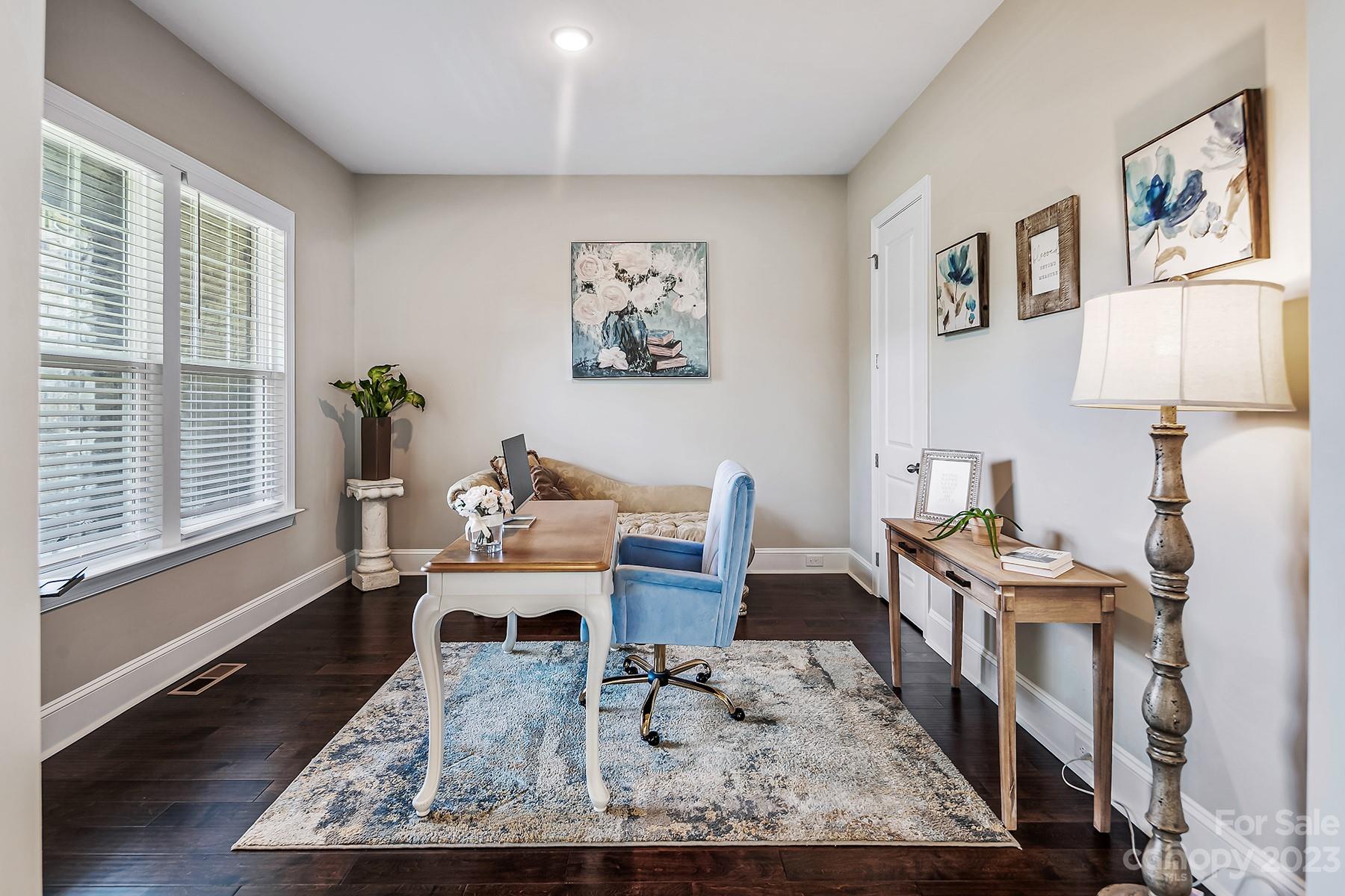 1004 Princessa Drive Wesley Chapel, NC 28104 - Photo 7 of 40 a living room with furniture and a window