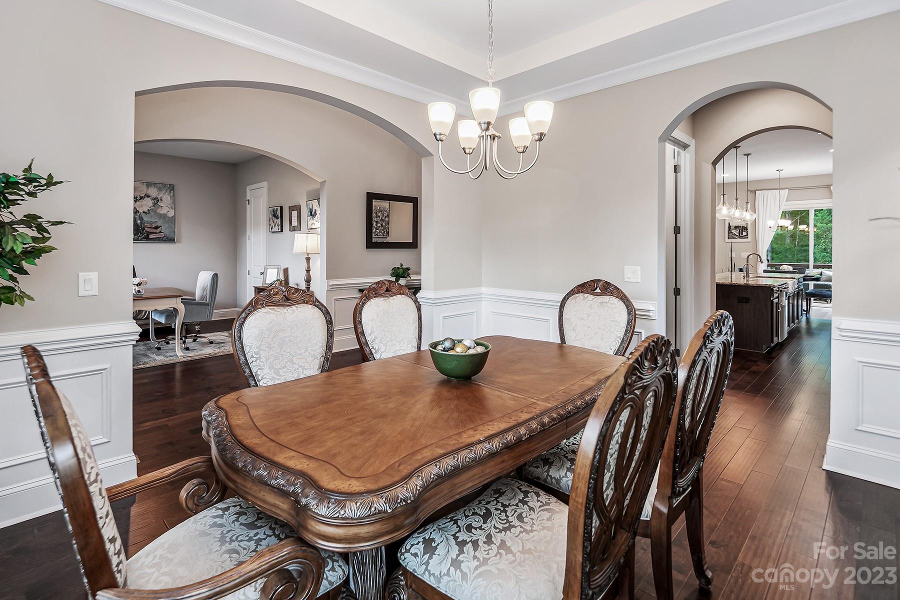 1004 Princessa Drive Wesley Chapel, NC 28104 - Photo 9 of 40 a view of a dining room with furniture