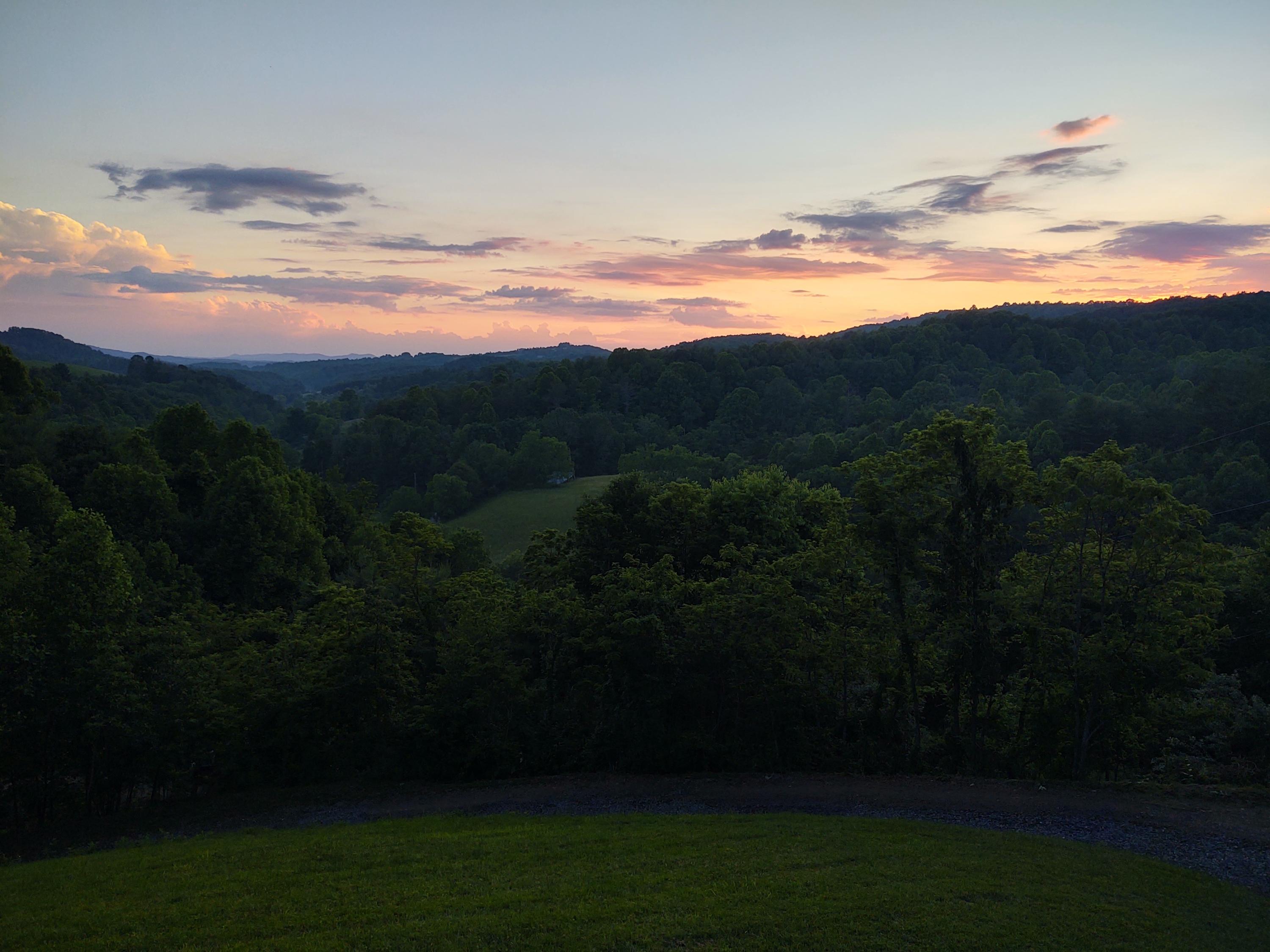 449 Laurel Creek Road Northeast Pilot, VA 24138 - Photo 18 of 72 449 Laurel Creek sunset from the deck vi