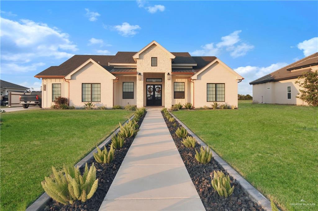1426 Moore Road Alamo, TX 78516 - Photo 1 of 1 View of front of property with a front yard