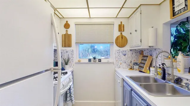a bathroom with a sink vanity and a mirror