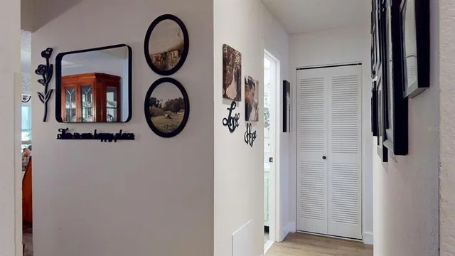 a front view of a house with a bathroom and a mirror