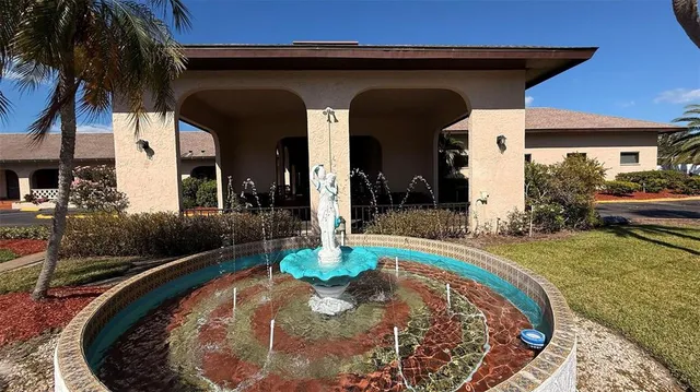 a view of a house with swimming pool