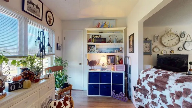 a view of hall way with furniture