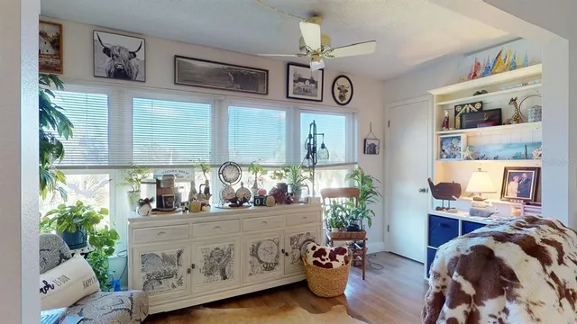 a bedroom with furniture and a bed