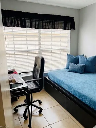 a view of a room with a large window