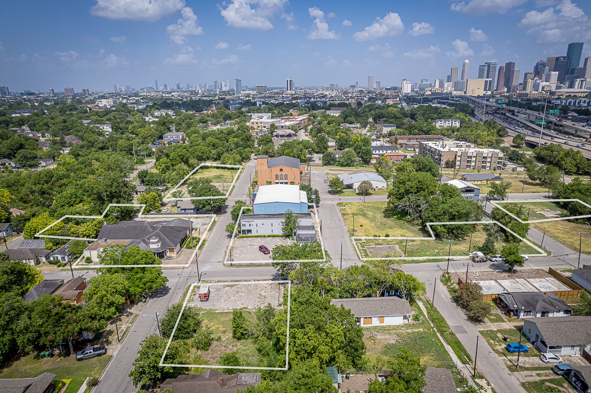 3229 Hadley Street Houston, TX 77004 - Photo 2 of 8 an aerial view of residential houses with city view