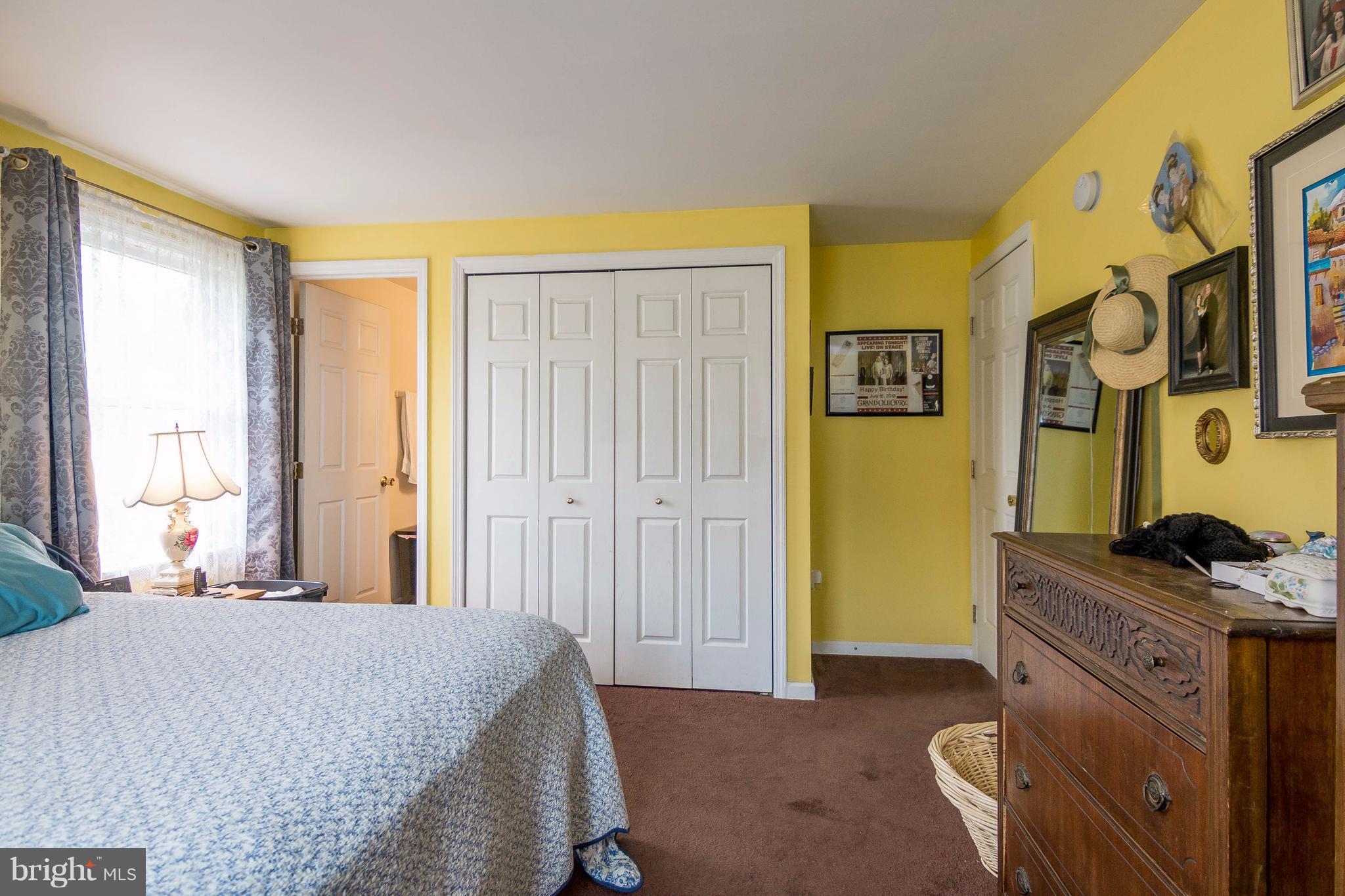 4009 Bill Moxley Road Mount Airy, MD 21771 - Photo 11 of 22 a bedroom with a bed and a window
