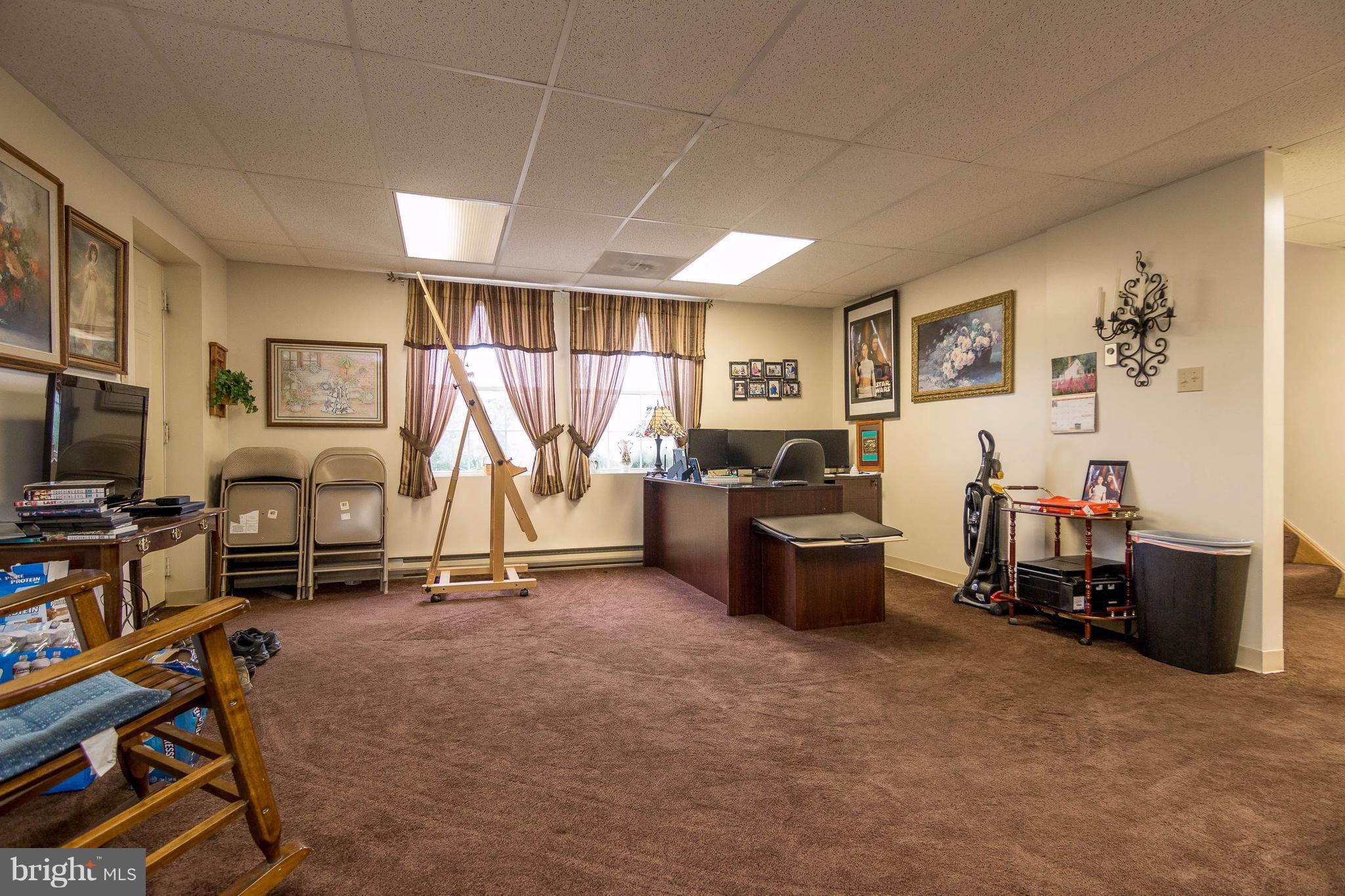 4009 Bill Moxley Road Mount Airy, MD 21771 - Photo 15 of 22 a view of a room with gym equipment