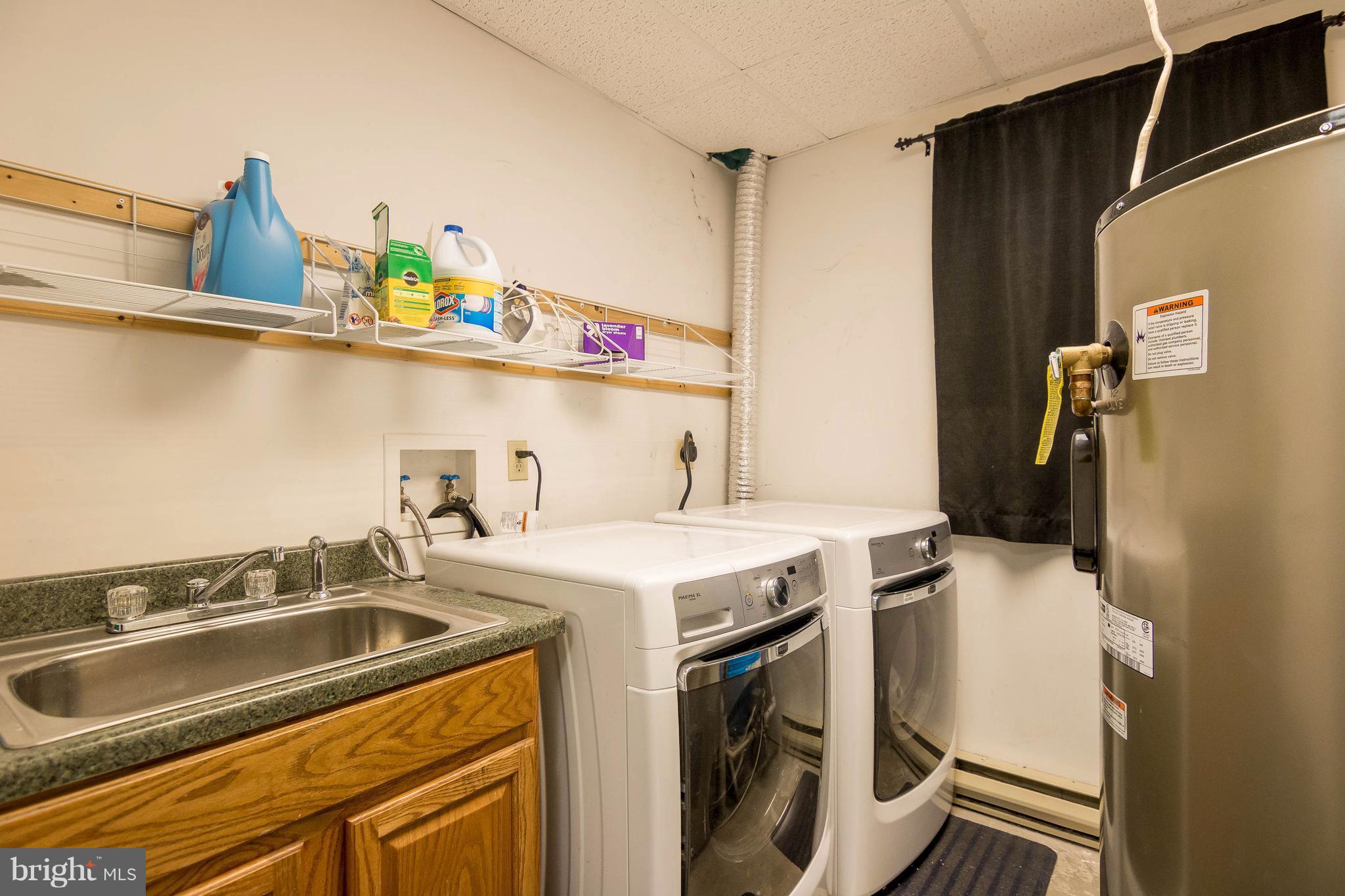 4009 Bill Moxley Road Mount Airy, MD 21771 - Photo 18 of 22 a utility room with dryer and washer