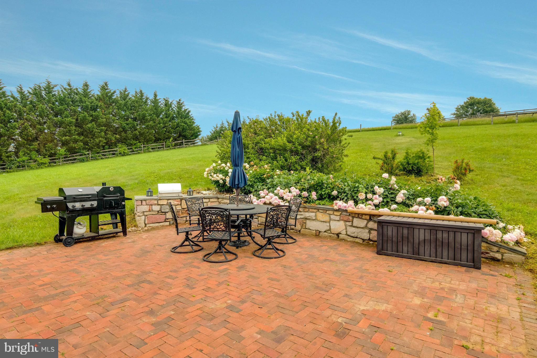 4009 Bill Moxley Road Mount Airy, MD 21771 - Photo 19 of 22 a view of a terrace with furniture and garden