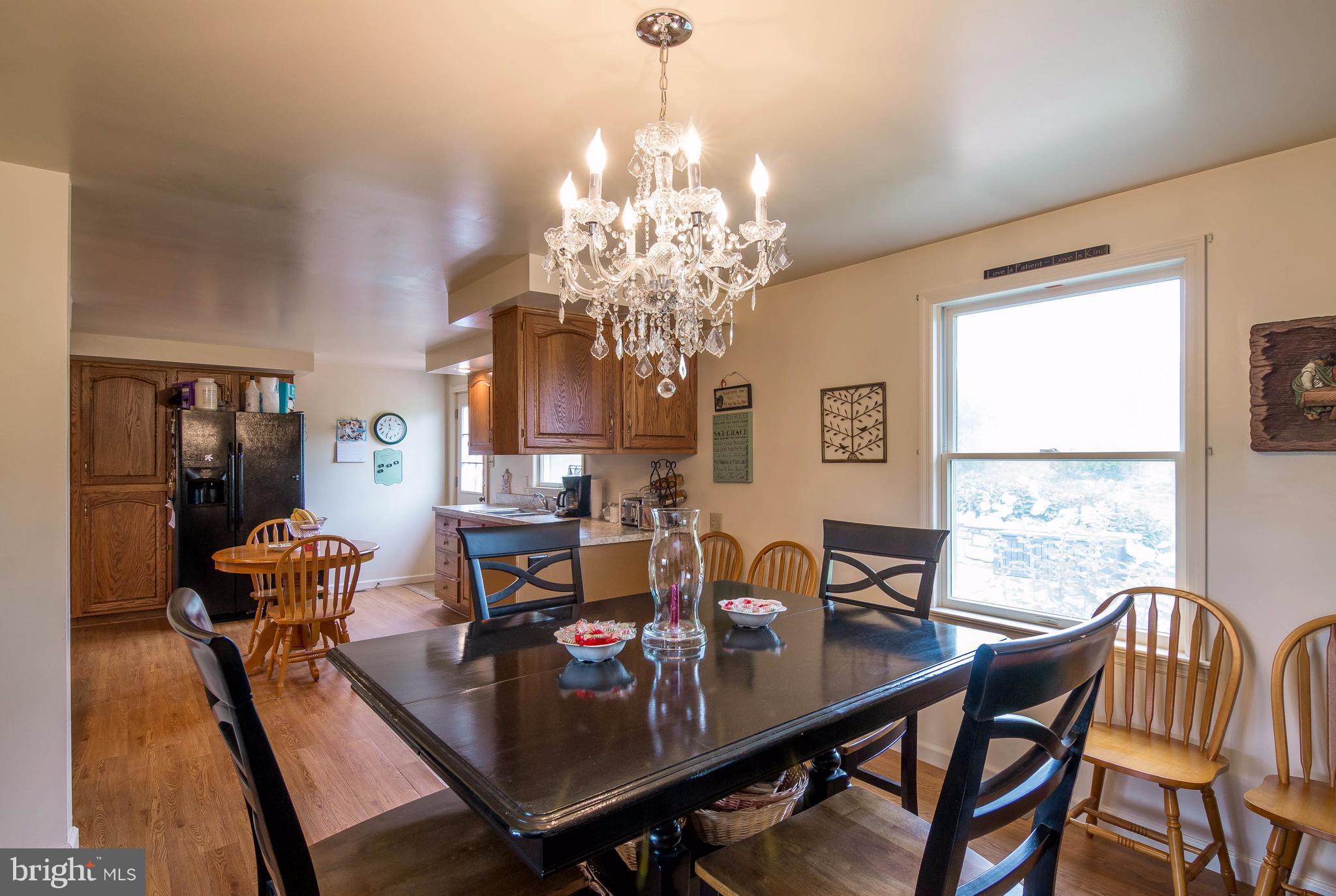 4009 Bill Moxley Road Mount Airy, MD 21771 - Photo 8 of 22 a view of a dining room with furniture window and outside view
