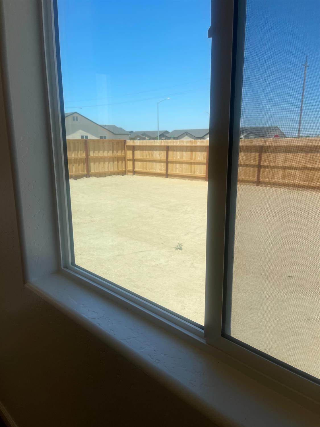 13320 4th Street, Unit LOT1 Parlier, CA 93648 - Photo 11 of 12 a view of a room next to a window