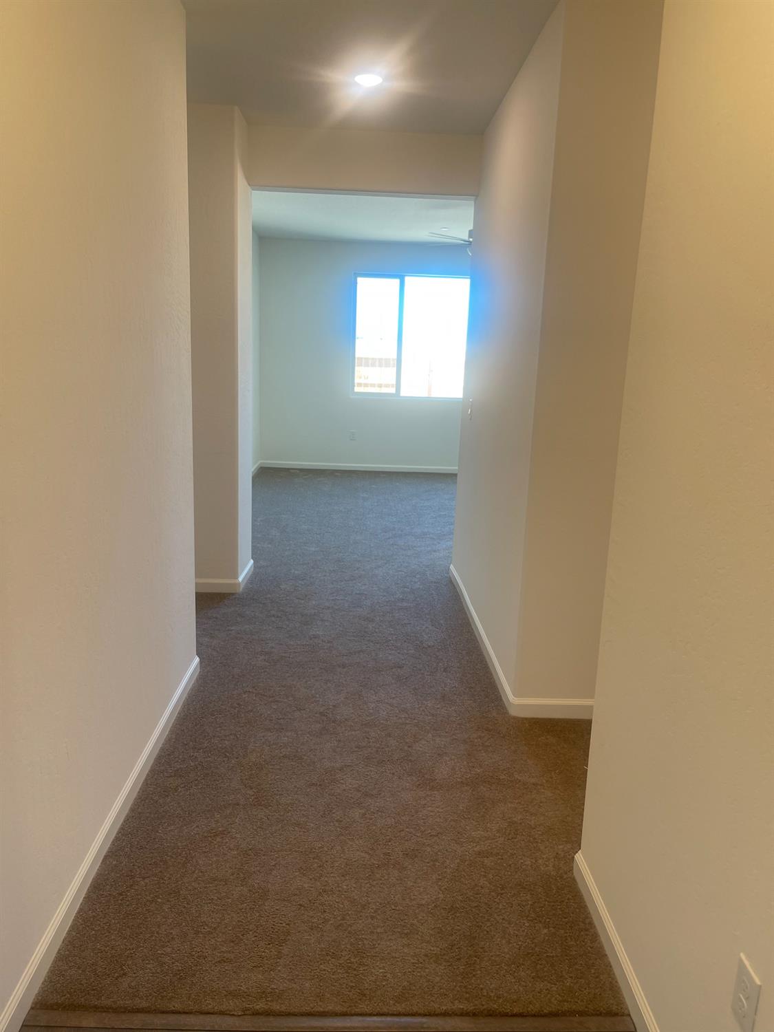 13320 4th Street, Unit LOT1 Parlier, CA 93648 - Photo 4 of 12 a view of hallway with window