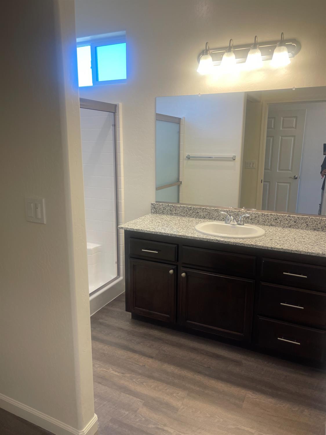 13320 4th Street, Unit LOT1 Parlier, CA 93648 - Photo 6 of 12 a room with a cabinets and a mirror