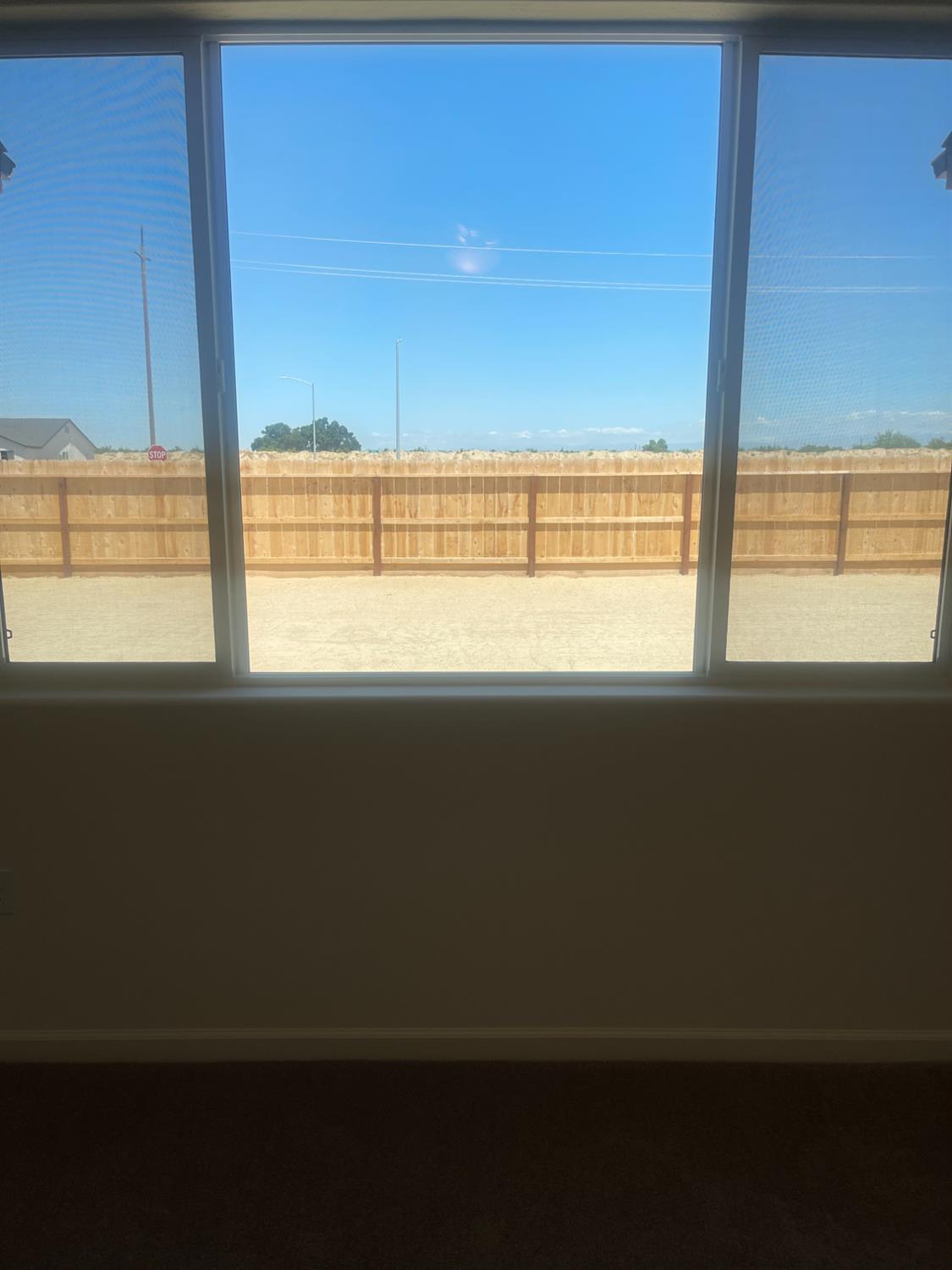 13320 4th Street, Unit LOT1 Parlier, CA 93648 - Photo 10 of 12 a view of a ocean from a window