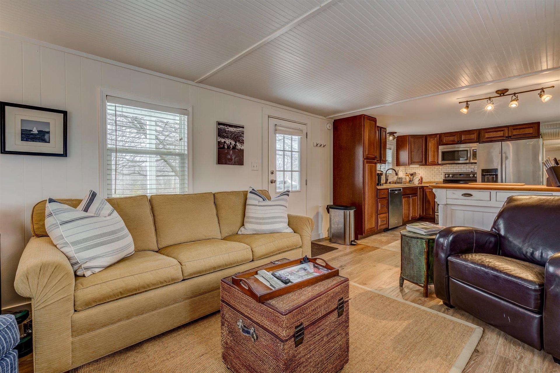 232 Munsons Road Penhook, VA 24137 - Photo 13 of 50 a living room with furniture and a kitchen