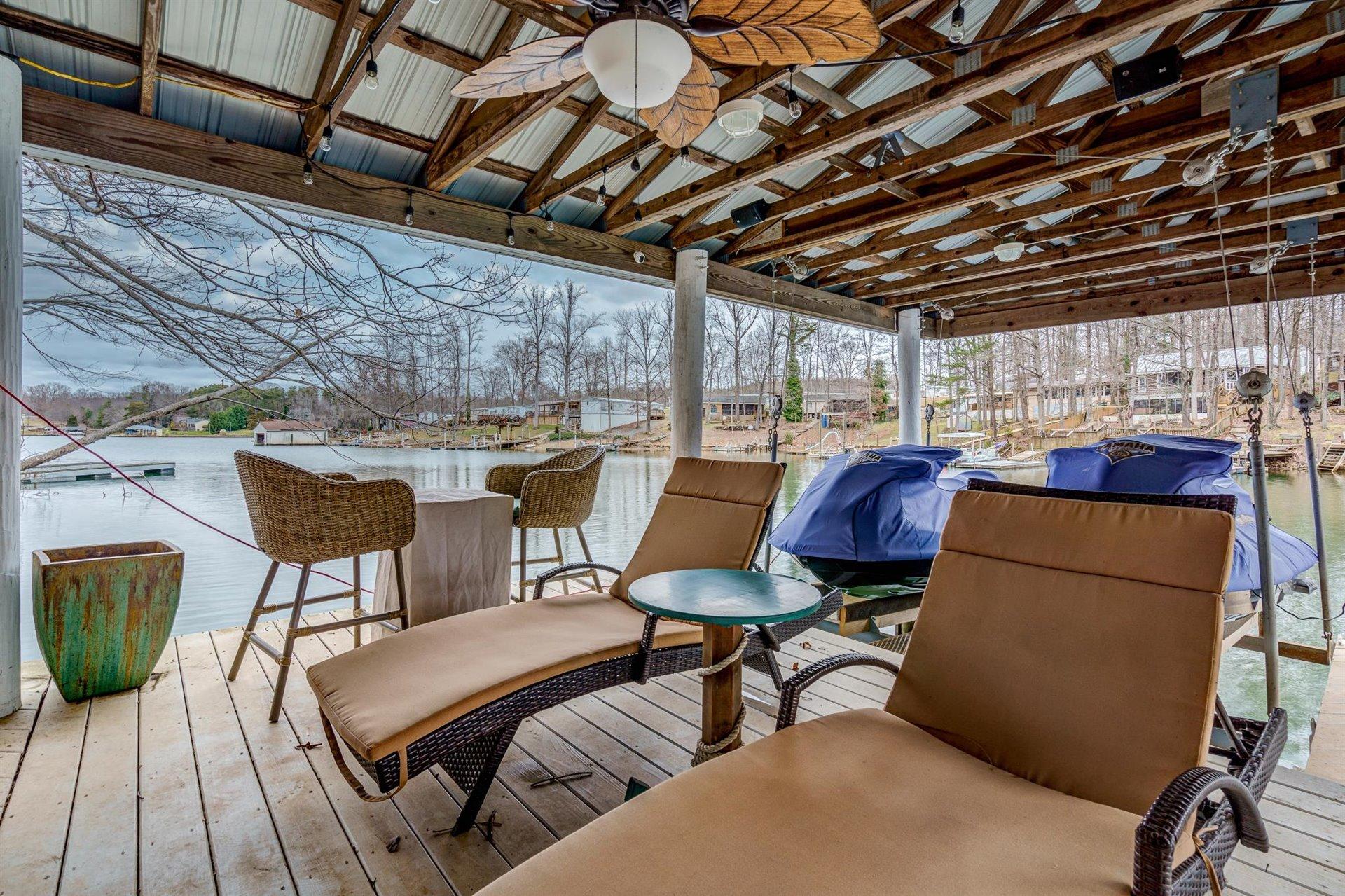 232 Munsons Road Penhook, VA 24137 - Photo 43 of 50 a view of a chairs and table in a patio
