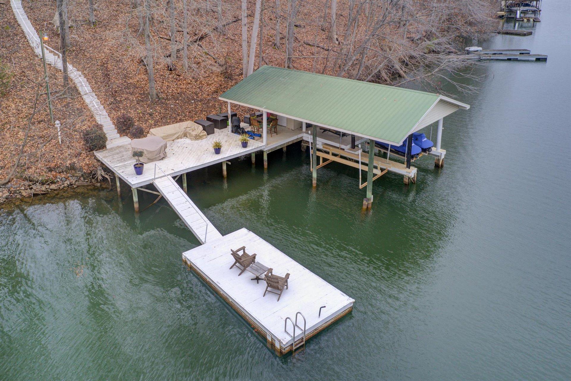 232 Munsons Road Penhook, VA 24137 - Photo 45 of 50 an aerial view of a house with a garden and lake view