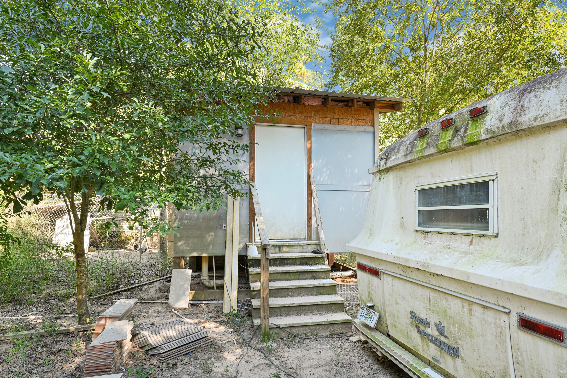157 Jim Browder Road Willis, TX 77378 - Photo 5 of 17 a view of entryway with wooden floor and fence