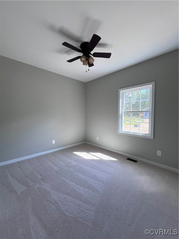954 Monroe Church Road Rice, VA 23966 - Photo 11 of 12 an empty room with windows and fan