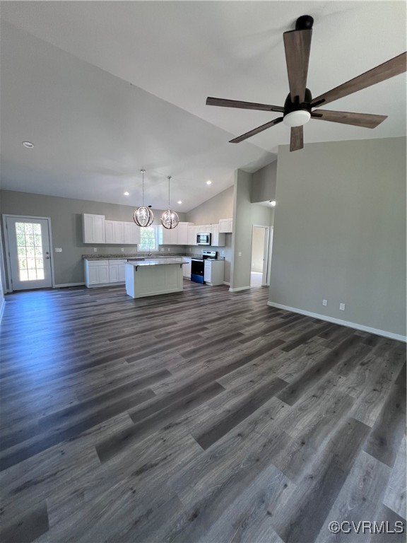 954 Monroe Church Road Rice, VA 23966 - Photo 2 of 12 a view of a living room a kitchen and a chandelier fan