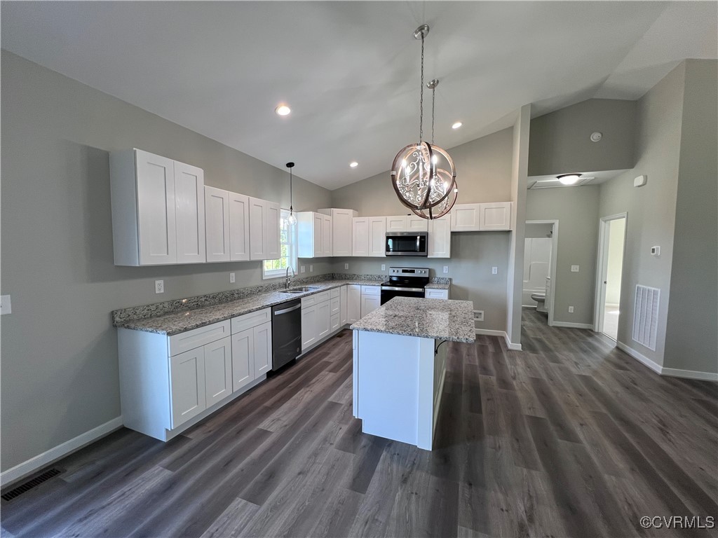 954 Monroe Church Road Rice, VA 23966 - Photo 5 of 12 a large kitchen with stainless steel appliances granite countertop a stove and cabinets