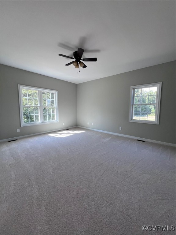 954 Monroe Church Road Rice, VA 23966 - Photo 7 of 12 a view of room with a ceiling fan and windows
