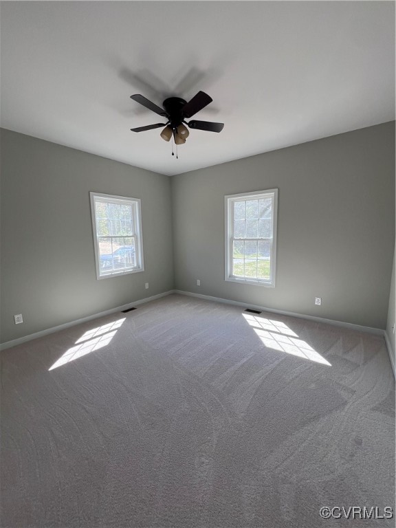 954 Monroe Church Road Rice, VA 23966 - Photo 10 of 12 a view of a big room with windows and chandelier fan