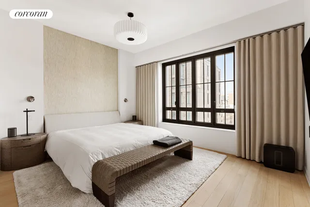 a kitchen with a stove a sink and cabinets