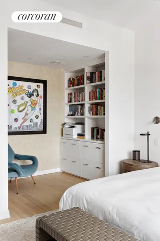 a kitchen with stainless steel appliances granite countertop a table and chairs in it