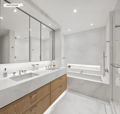 a bedroom with a bed and book shelf