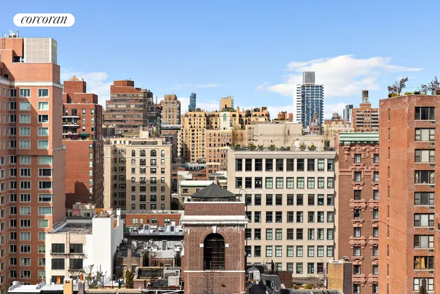 a bathroom with a sink a mirror and shower